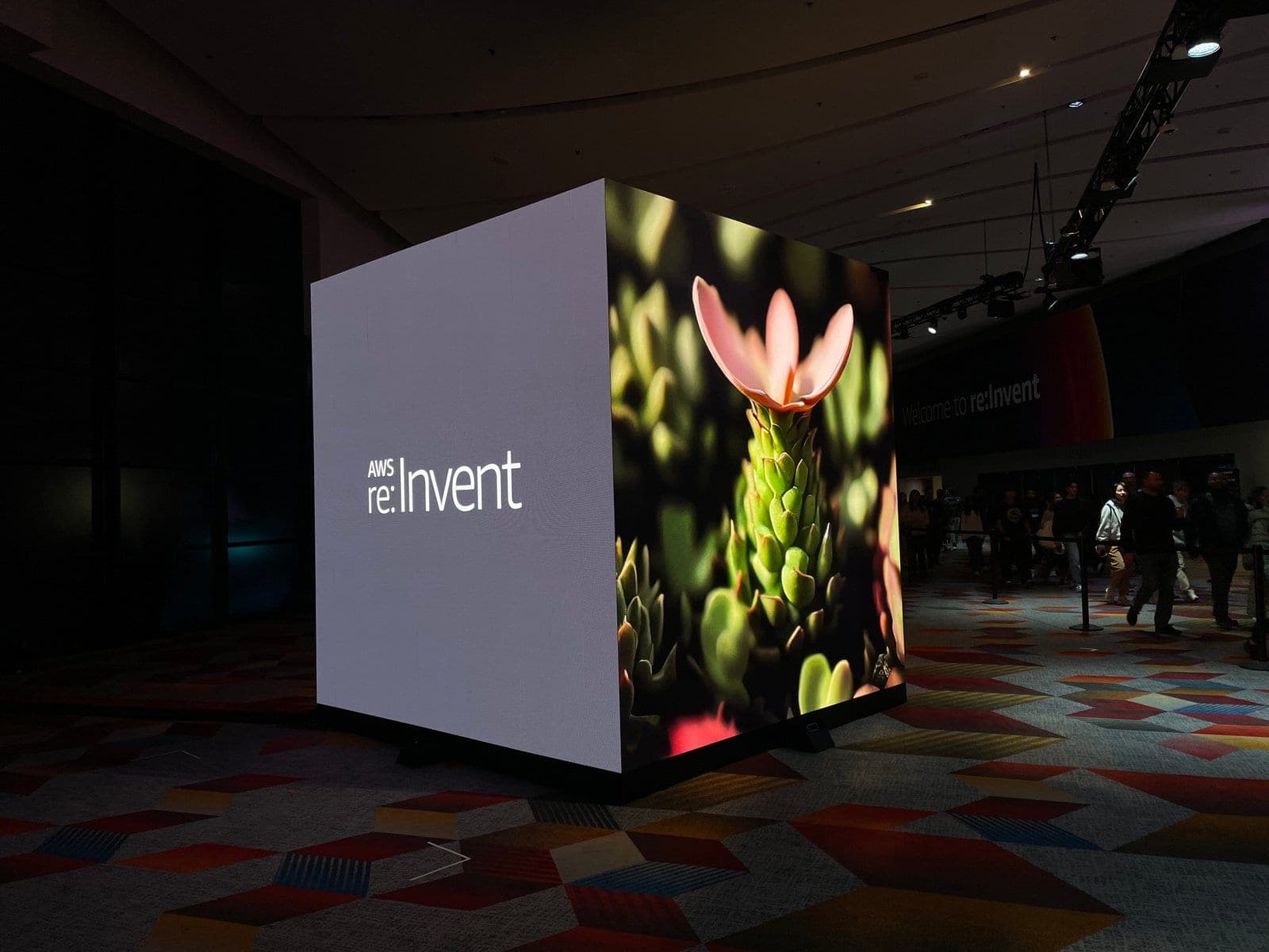 The cube beside the re:Invent sign