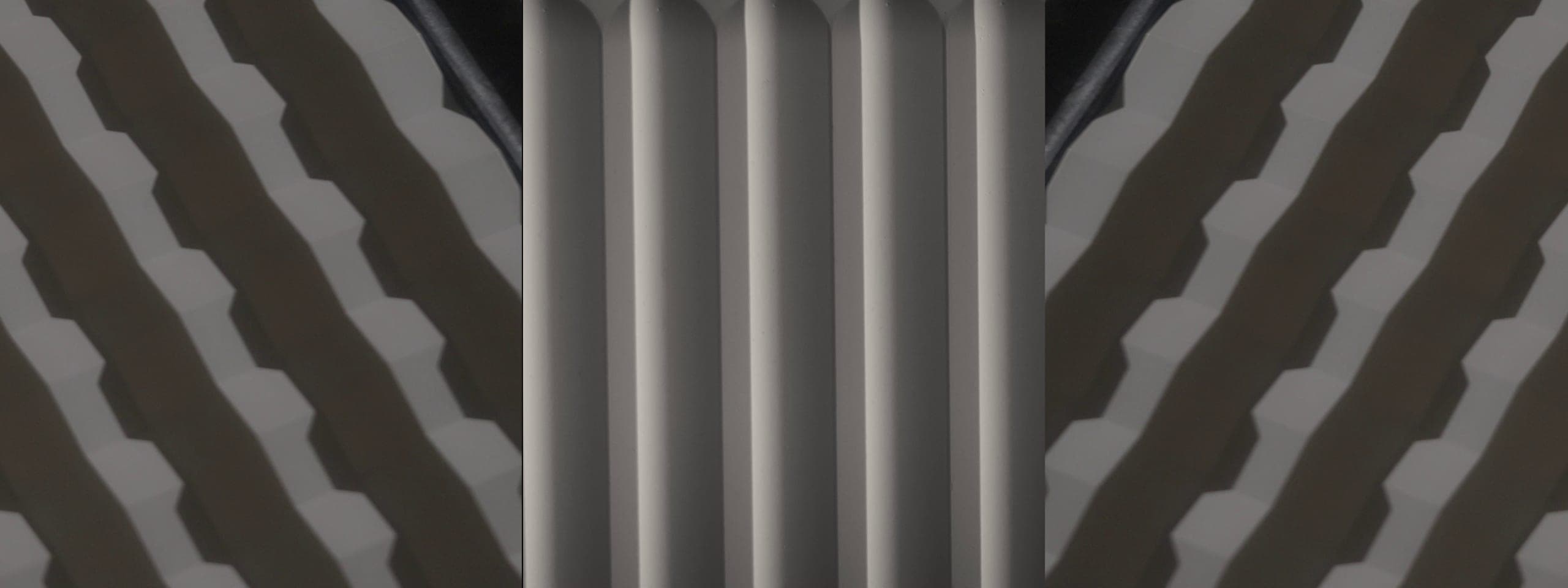 Fluted wave surfaces across the three displays