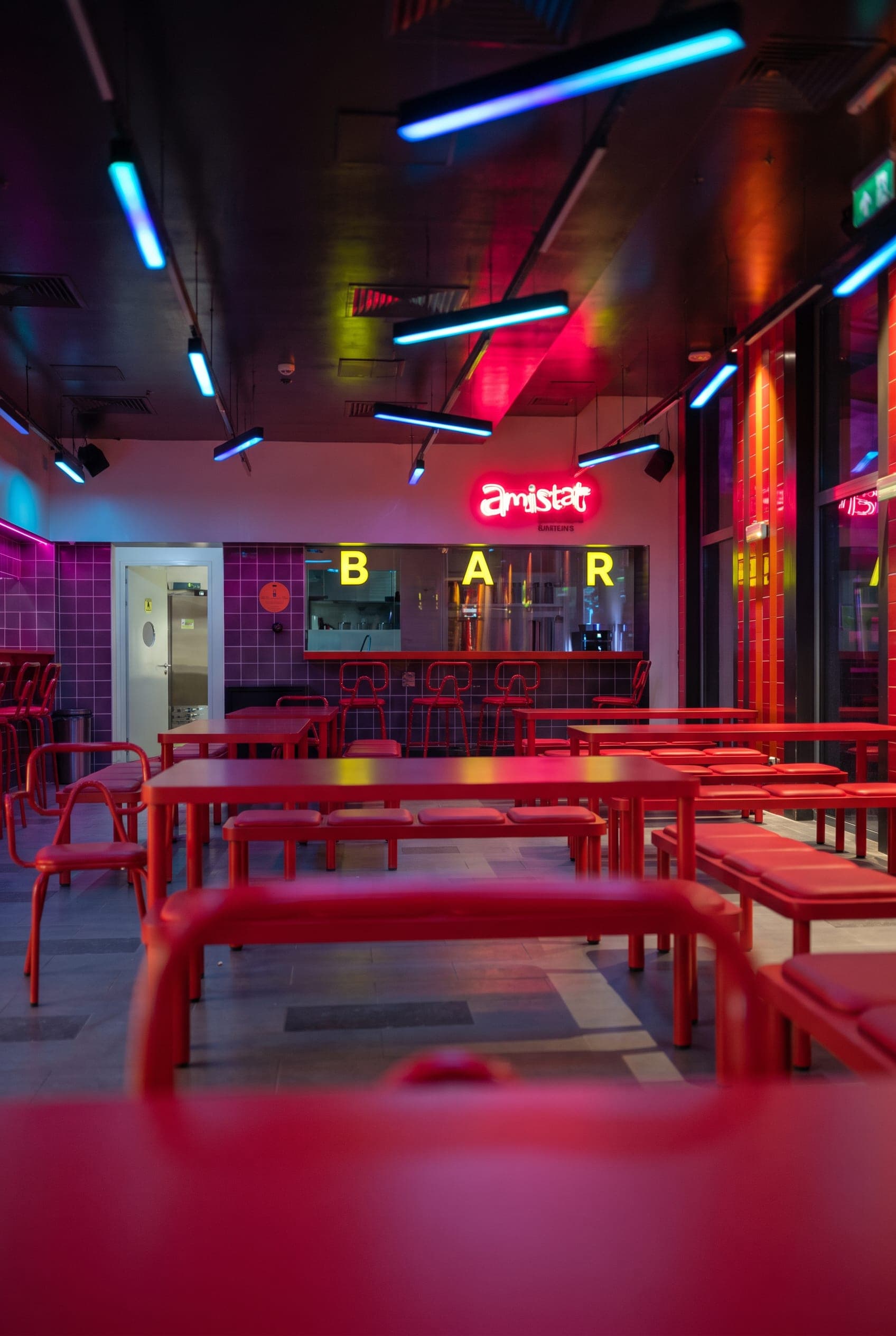 Empty bar with the amistat neon over the counter
