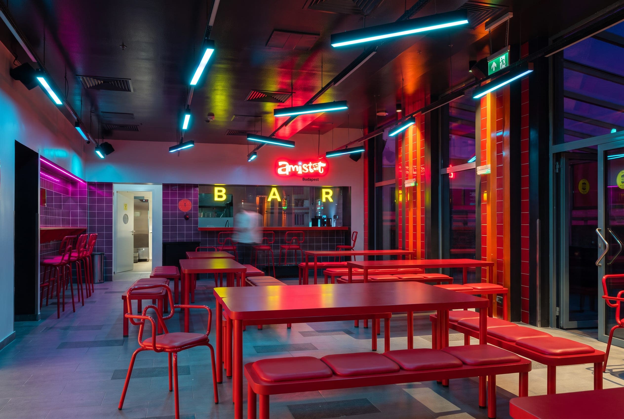 Red dining room under neon light