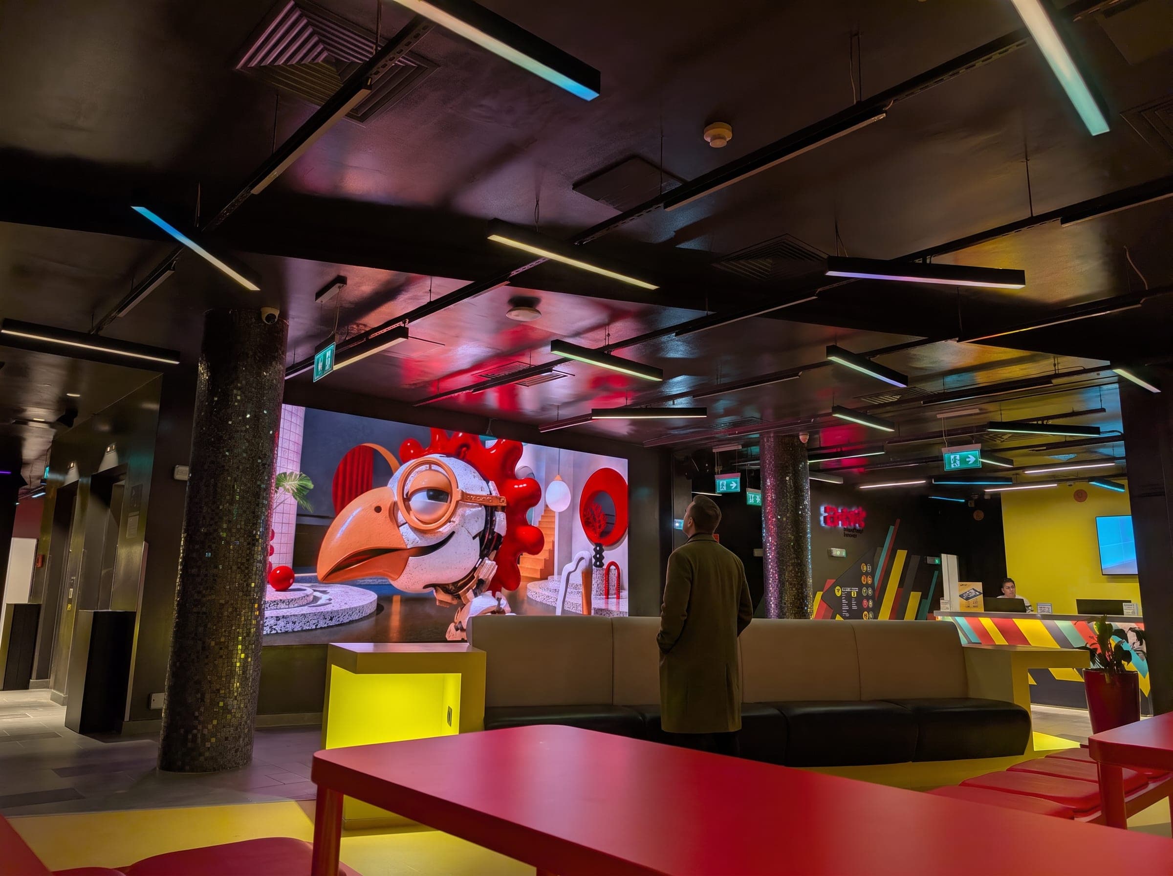 Lobby with LED wall and yellow counter
